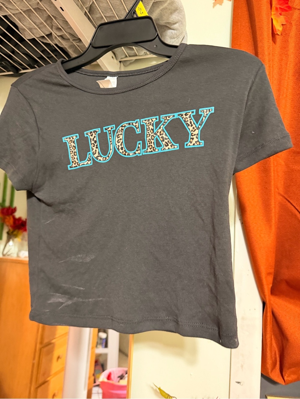 & Other Stories Black Tee with Turquoise-Outlined Leopard 'LUCKY'